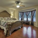 Large master bedroom with beautiful bay window.